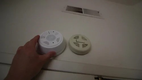 A smoke detector with a hidden camera